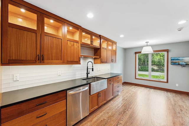 1775 Lexington Ave S Unit 26, Lilydale, MN 55118 - kitchen with dishwasher, dark countertops, decorative backsplash, brown cabinets, and recessed lighting