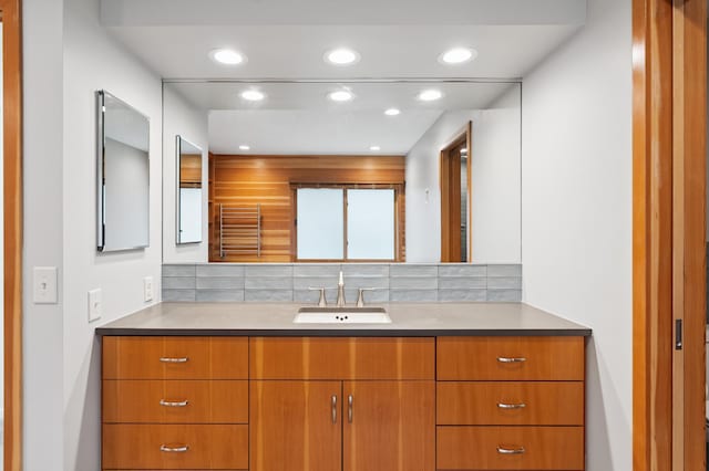1775 Lexington Ave S Unit 26, Lilydale, MN 55118 - bathroom with vanity, decorative backsplash, and recessed lighting