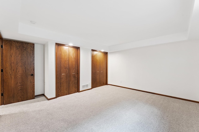 1775 Lexington Ave S Unit 26, Lilydale, MN 55118 - unfurnished bedroom featuring carpet, two closets, and recessed lighting