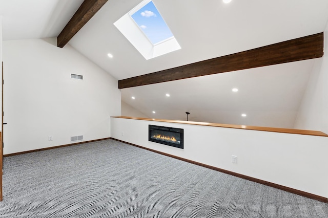 1775 Lexington Ave S Unit 26, Lilydale, MN 55118 - unfurnished living room with recessed lighting, a skylight, carpet flooring, and a glass covered fireplace