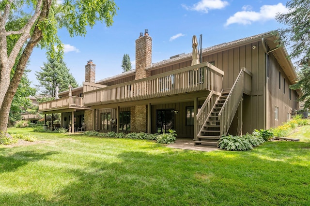 1775 Lexington Ave S Unit 26, Lilydale, MN 55118 - back of house with a wooden deck, a yard, and stairs