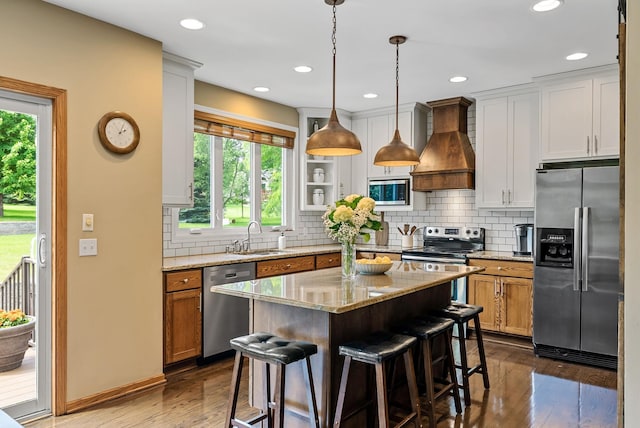 2227 Stone Creek Ln E, Chanhassen, MN 55317 - kitchen with appliances with stainless steel finishes, custom range hood, dark wood-style flooring, healthy amount of natural light, and recessed lighting