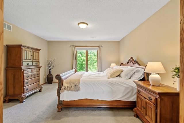 2227 Stone Creek Ln E, Chanhassen, MN 55317 - bedroom featuring light colored carpet and a textured ceiling