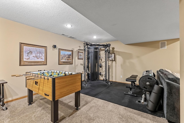 2227 Stone Creek Ln E, Chanhassen, MN 55317 - recreation room with a textured ceiling and recessed lighting