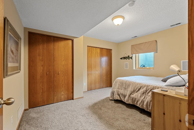 2227 Stone Creek Ln E, Chanhassen, MN 55317 - bedroom featuring carpet flooring and a textured ceiling