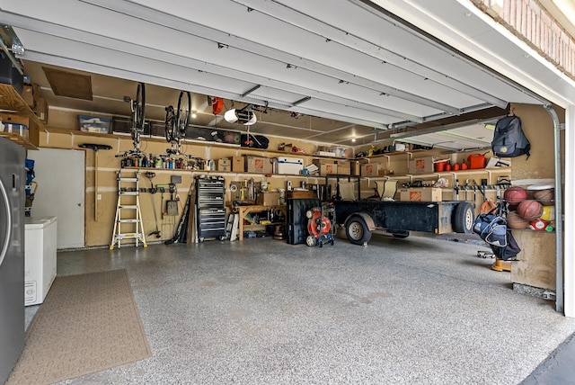 2227 Stone Creek Ln E, Chanhassen, MN 55317 - garage featuring a workshop area and a garage door opener
