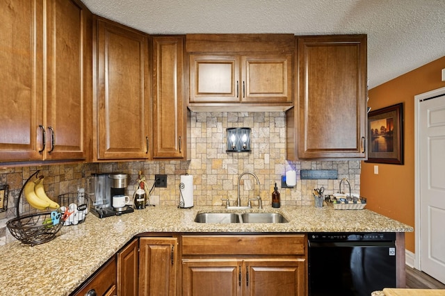 3950 Upper 75th St E, Inver Grove Heights, MN 55076 - kitchen featuring black dishwasher, a textured ceiling, backsplash, light stone counters, and brown cabinetry