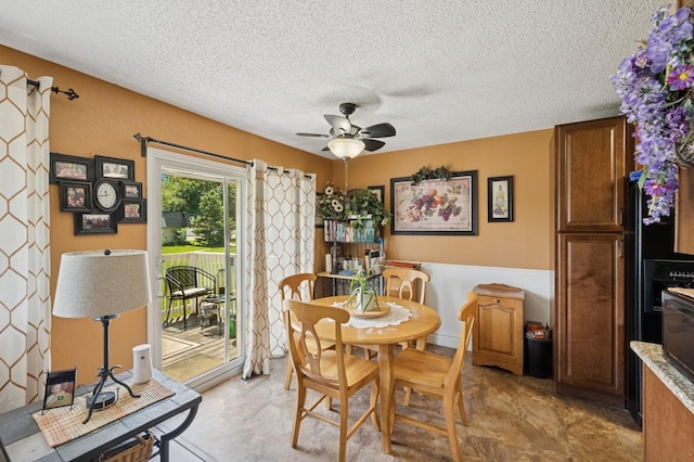 3950 Upper 75th St E, Inver Grove Heights, MN 55076 - dining room with a ceiling fan and a textured ceiling