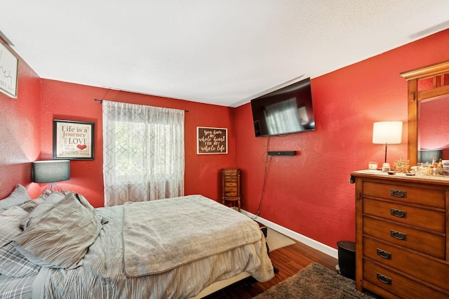 3950 Upper 75th St E, Inver Grove Heights, MN 55076 - bedroom with wood finished floors and a textured wall