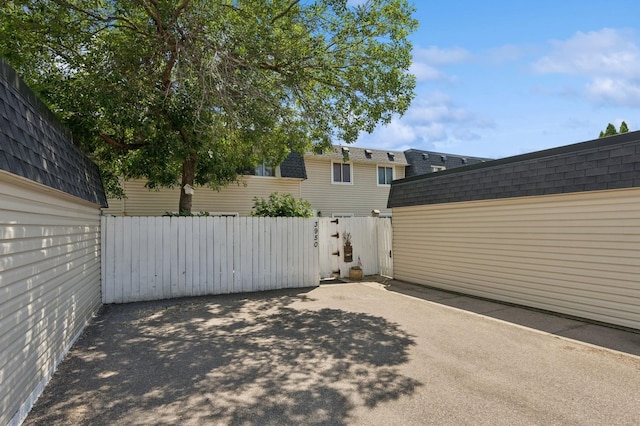 3950 Upper 75th St E, Inver Grove Heights, MN 55076 - view of side of property featuring roof with shingles