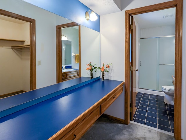 1132 Westbury Cir, Eagan, MN 55123 - bathroom featuring a shower stall, vanity, and a walk in closet