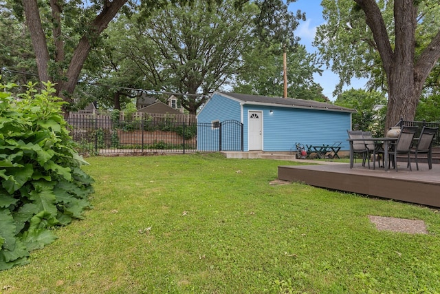 981 Bayless Ave, Saint Paul, MN 55114 - view of yard with an outdoor structure, outdoor dining space, and a deck