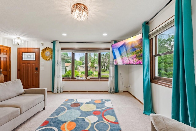 7795 Van Buren St NE, Spring Lake Park, MN 55432 - living area featuring a chandelier, carpet flooring, plenty of natural light, and recessed lighting