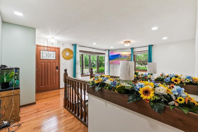 7795 Van Buren St NE, Spring Lake Park, MN 55432 - entryway with light wood-style flooring and recessed lighting