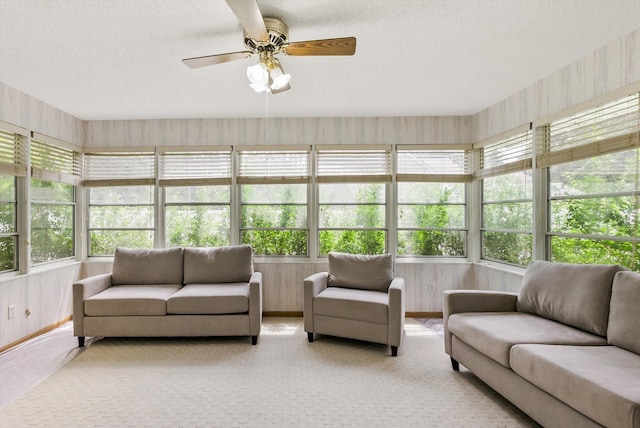 7795 Van Buren St NE, Spring Lake Park, MN 55432 - sunroom / solarium featuring a textured ceiling and baseboards