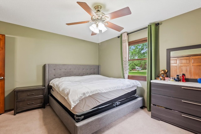 7795 Van Buren St NE, Spring Lake Park, MN 55432 - bedroom with light carpet and ceiling fan