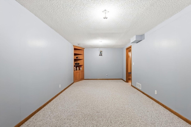 7795 Van Buren St NE, Spring Lake Park, MN 55432 - unfurnished room with a textured ceiling and light carpet