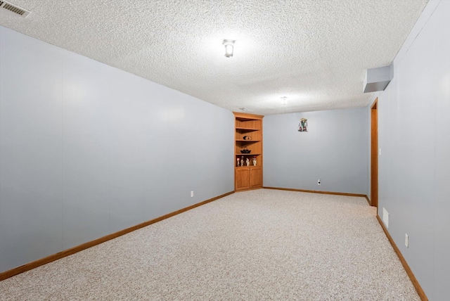 7795 Van Buren St NE, Spring Lake Park, MN 55432 - finished below grade area with light colored carpet and a textured ceiling