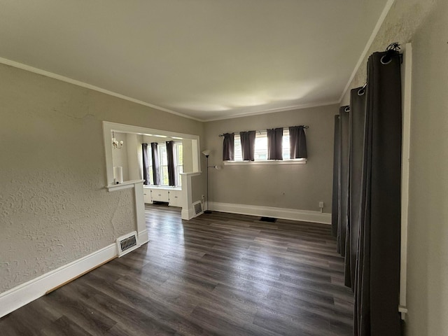 1678 Minnehaha Ave E, Saint Paul, MN 55106 - unfurnished room featuring dark wood-style floors and ornamental molding