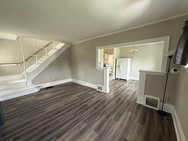 1678 Minnehaha Ave E, Saint Paul, MN 55106 - unfurnished living room featuring dark wood-style flooring, stairway, ornamental molding, and a chandelier