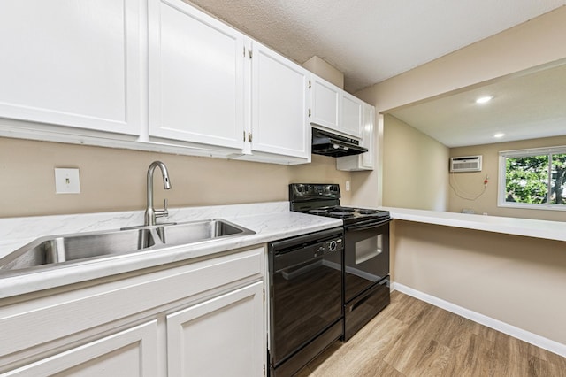 10311 Cedar Lake Rd Unit 210, Minnetonka, MN 55305 - kitchen featuring black appliances, under cabinet range hood, light wood finished floors, an AC wall unit, and white cabinets