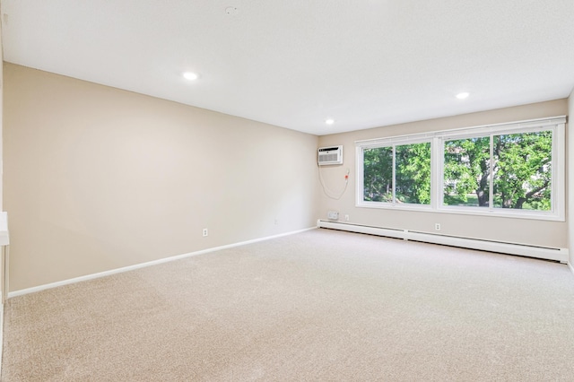 10311 Cedar Lake Rd Unit 210, Minnetonka, MN 55305 - empty room featuring a baseboard radiator, carpet floors, a wall unit AC, and recessed lighting