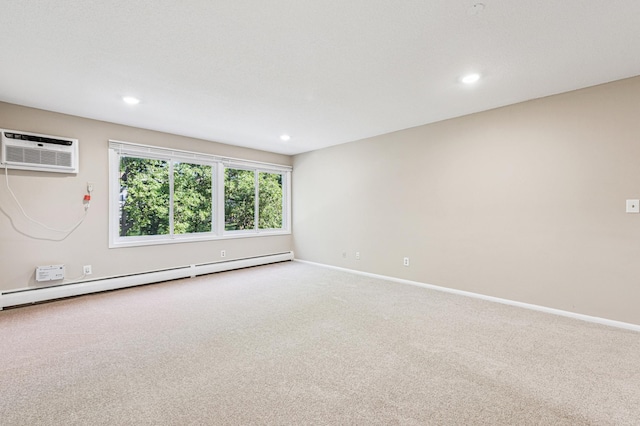 10311 Cedar Lake Rd Unit 210, Minnetonka, MN 55305 - carpeted spare room featuring a baseboard heating unit, a wall mounted AC, and recessed lighting