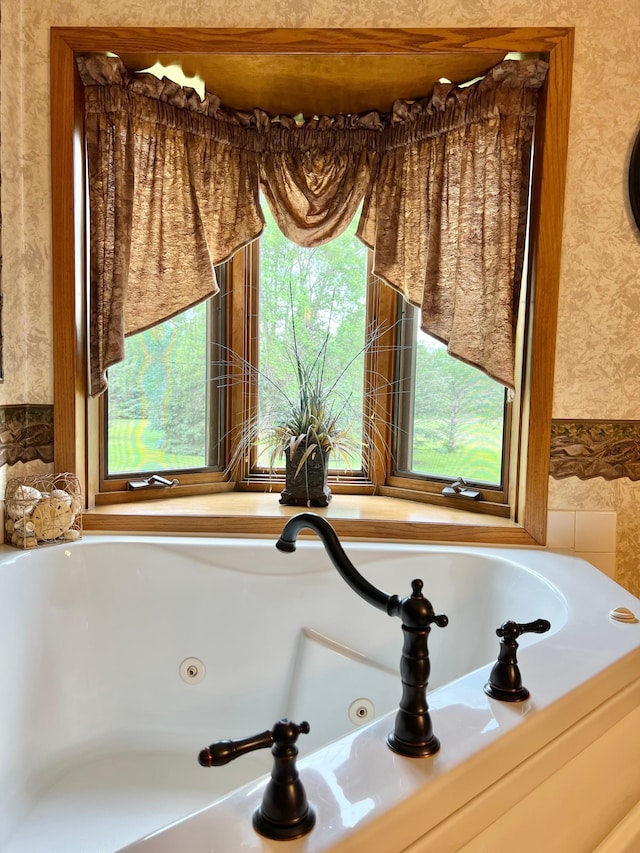 4095 125th St SE, Granite Falls, MN 56241 - bathroom featuring wallpapered walls and a whirlpool tub