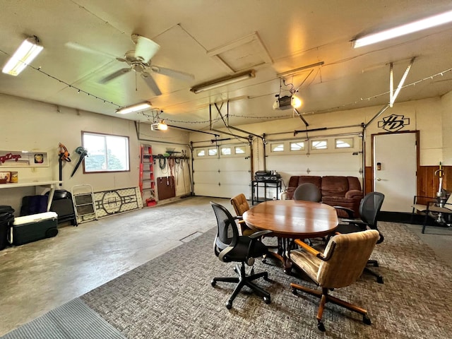 4095 125th St SE, Granite Falls, MN 56241 - garage with a garage door opener and ceiling fan
