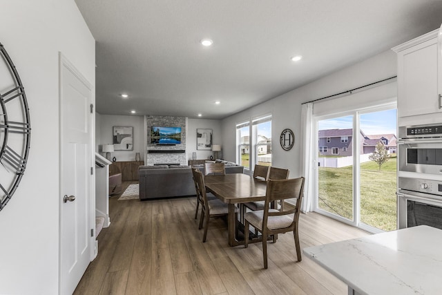 1959 Tamarack Rd, Carver, MN 55315 - dining room featuring light wood-style flooring and recessed lighting