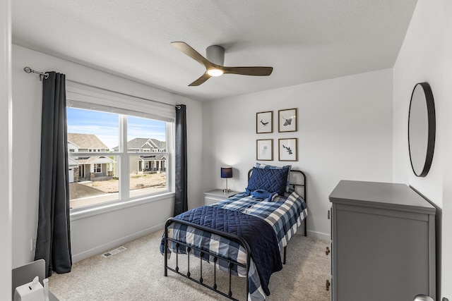 1959 Tamarack Rd, Carver, MN 55315 - bedroom with carpet, a ceiling fan, and a textured ceiling