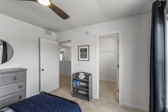 1959 Tamarack Rd, Carver, MN 55315 - bedroom with light carpet, a spacious closet, and ceiling fan