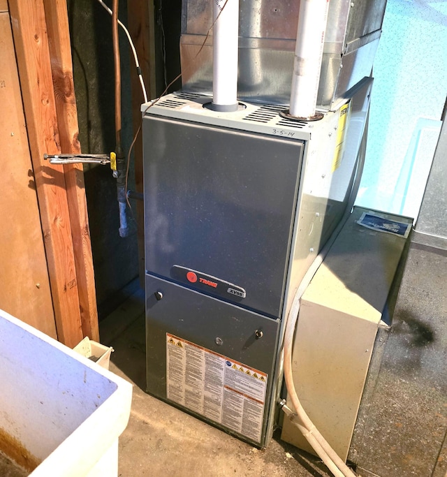 45356 140th St, Swan Lake Twp, MN 56235 - utility room with heating unit
