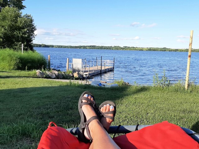 45356 140th St, Swan Lake Twp, MN 56235 - dock area featuring a lawn and a water view