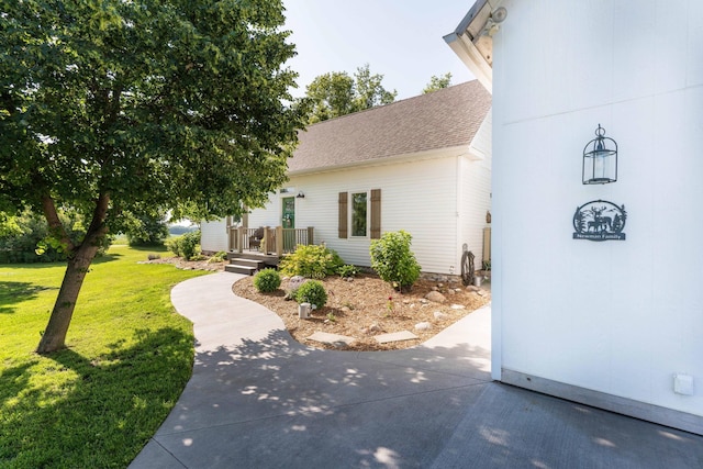 18377 County Highway 25, Fergus Falls, MN 56537 - view of side of property with roof with shingles and a lawn