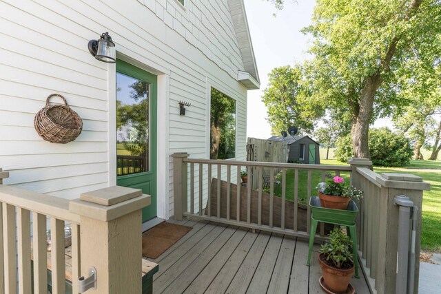 18377 County Highway 25, Fergus Falls, MN 56537 - wooden deck featuring a storage unit