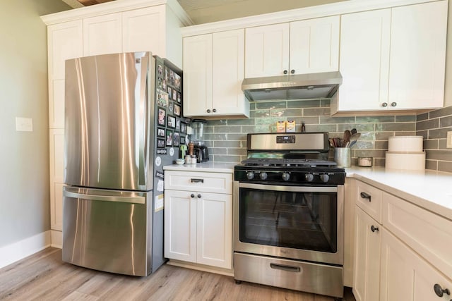 18377 County Highway 25, Fergus Falls, MN 56537 - kitchen with stainless steel appliances, range hood, light wood finished floors, and light countertops