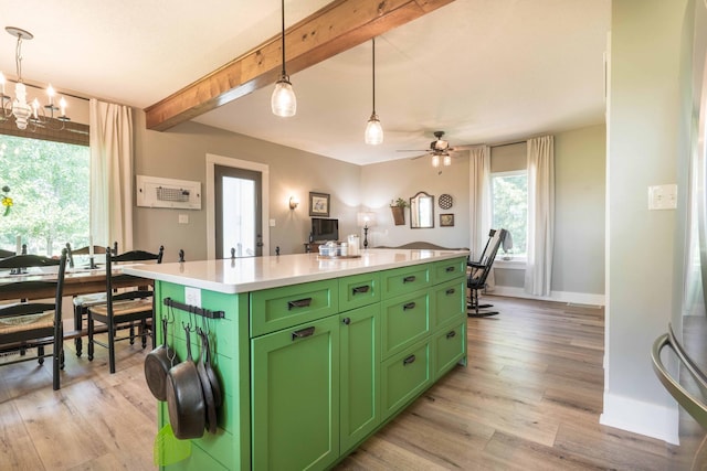 18377 County Highway 25, Fergus Falls, MN 56537 - kitchen with green cabinetry, light wood-type flooring, beamed ceiling, light countertops, and a ceiling fan