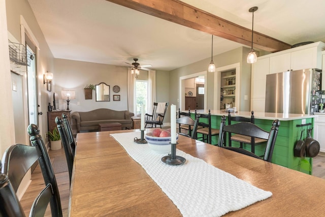18377 County Highway 25, Fergus Falls, MN 56537 - dining area featuring ceiling fan, light wood-type flooring, and beam ceiling