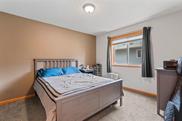 3902 Strathmore Ln SE, Rochester, MN 55904 - bedroom featuring carpet and a textured ceiling