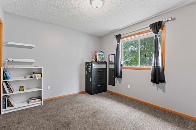 3902 Strathmore Ln SE, Rochester, MN 55904 - bedroom with carpet floors and a textured ceiling