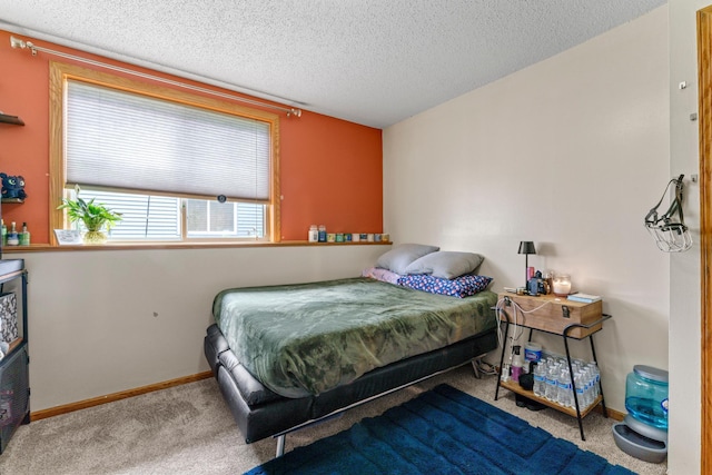 3902 Strathmore Ln SE, Rochester, MN 55904 - bedroom featuring carpet floors and a textured ceiling