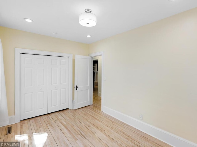 3201 Xenwood Ave S, Saint Louis Park, MN 55416 - unfurnished bedroom featuring light wood finished floors, a closet, and recessed lighting