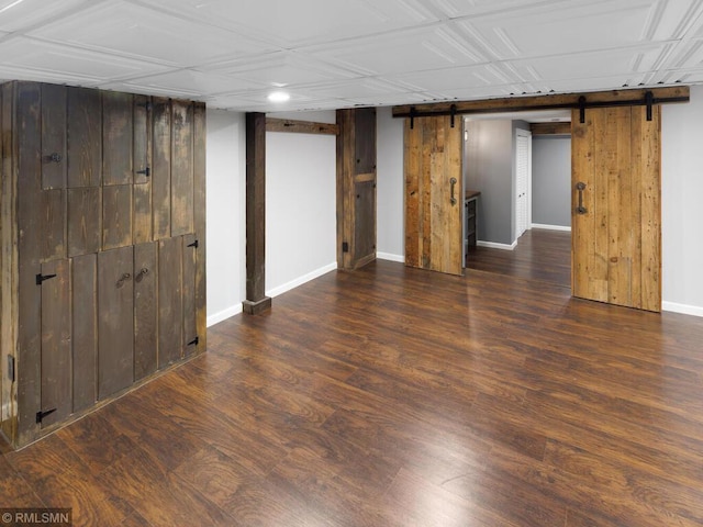 3201 Xenwood Ave S, Saint Louis Park, MN 55416 - finished basement with a barn door, wood finished floors, wood walls, and recessed lighting