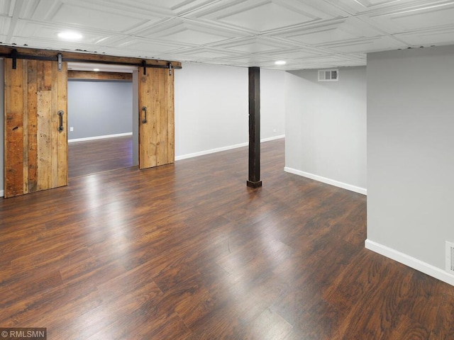 3201 Xenwood Ave S, Saint Louis Park, MN 55416 - finished below grade area with a barn door, recessed lighting, wood finished floors, an ornate ceiling, and wood walls