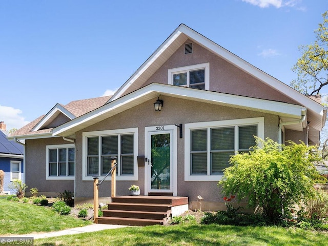3201 Xenwood Ave S, Saint Louis Park, MN 55416 - bungalow with stucco siding and a front yard