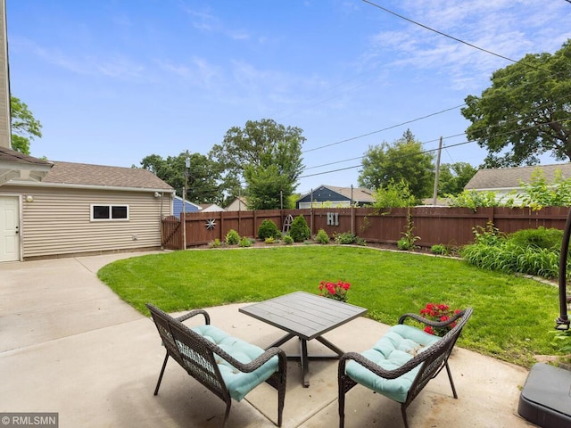 3201 Xenwood Ave S, Saint Louis Park, MN 55416 - fenced backyard with a patio area and a gate