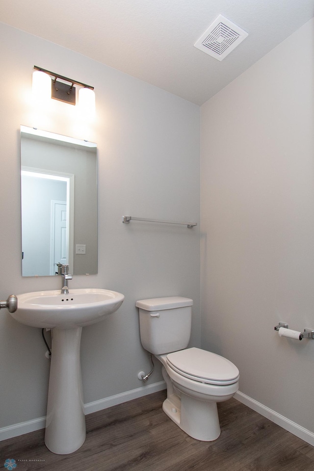 1449 68th Ave S, Fargo, ND 58104 - bathroom featuring wood finished floors