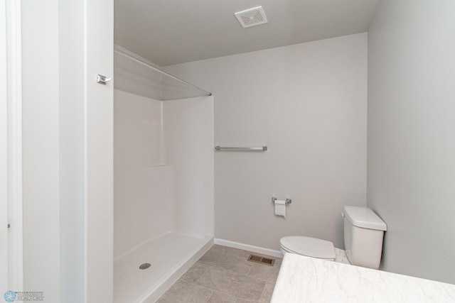 1449 68th Ave S, Fargo, ND 58104 - bathroom featuring a shower and tile patterned flooring