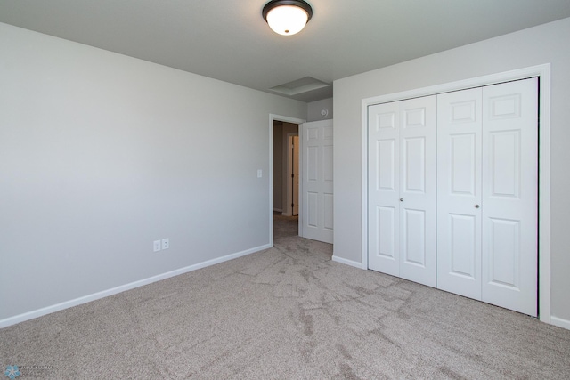 1449 68th Ave S, Fargo, ND 58104 - unfurnished bedroom featuring carpet flooring and a closet
